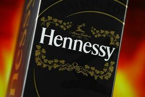 KYIV, UKRAINE - MAY 4, 2022 Hennessy Very Special original alcohol bottle on wooden table photo