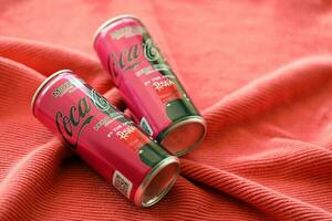 KYIV, UKRAINE - JULY 7, 2023 Coca-Cola zero sugar can with Rosalia design limited edition on red background photo