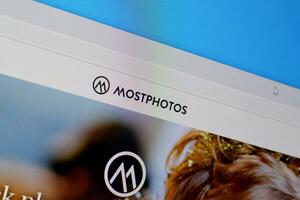 Homepage of mostphotos website on the display of PC, url - mostphotos.com. photo