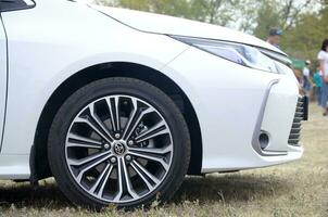 Toyota corolla wheel with dunlop sport maxx tires and aluminium rims photo