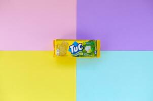 Tuc snack pack on bright multi colored flat background photo