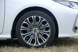 Toyota corolla wheel with dunlop sport maxx tires and aluminium rims photo