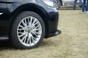 Toyota corolla wheel with bridgestone turanza tires and aluminium rims photo