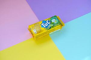 Tuc snack pack on bright multi colored flat background photo