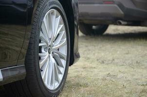 Toyota corolla wheel with bridgestone turanza tires and aluminium rims photo