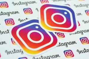 Instagram pattern printed on paper with small instagram logos and inscriptions. Instagram is American photo and video-sharing social networking service owned by Facebook