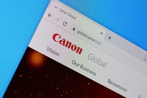 Homepage of canon website on the display of PC, url - global.canon. photo