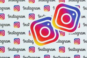 Instagram pattern printed on paper with small instagram logos and inscriptions. Instagram is American photo and video-sharing social networking service owned by Facebook