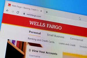 Homepage of wells fargo website on the display of PC, url - wellsfargo.com. photo