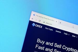 Homepage of okex website on the display of PC, url - okex.com. photo