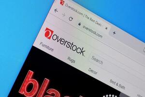 Homepage of overstock website on the display of PC, url - overstock.com. photo
