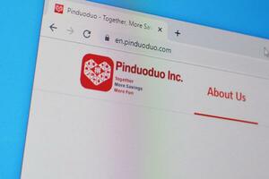 Homepage of pinduoduo website on the display of PC, url - pinduoduo.com. photo