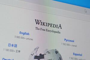 Homepage of wikipedia website on the display of PC, url - wikipedia.org. photo