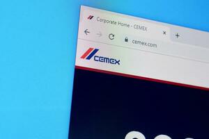 Homepage of cemex website on the display of PC, url - cemex.com. photo