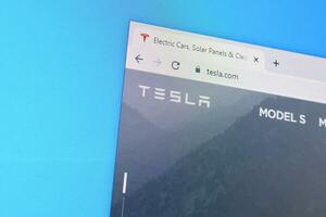 Homepage of tesla website on the display of PC, url - tesla.com. photo