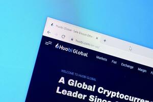 Homepage of huobi website on the display of PC, url - huobi.com. photo