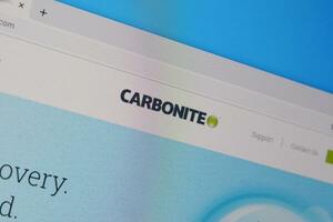 Homepage of carbonite website on the display of PC, url - carbonite.com. photo