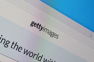 Homepage of gettyimages website on the display of PC, url - gettyimages.com. photo