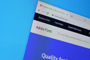 Web page of adobe fonts product on official website on the display of PC photo