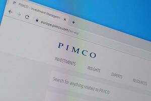 Homepage of pimco website on the display of PC, url - pimco.com. photo