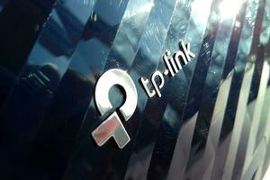 New tp-link logo on wireless router modem tp link Archer C20 AC750 reflective surface photo