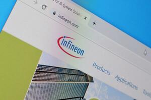Homepage of infineon website on the display of PC, url - infineon.com. photo