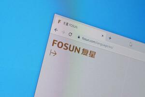 Homepage of fosun website on the display of PC, url - fosun.com. photo