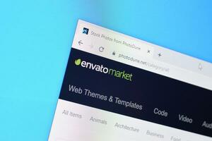 Homepage of envato market photodune website on the display of PC, url - photodune.net. photo