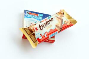 Kinder Chocolate small box for kids and bueno white chocolate bar made by Ferrero SpA. Kinder is a confectionery product brand line of multinational manufacturer Ferrero photo