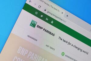 Homepage of bnp paribas website on the display of PC, url - group.bnpparibas. photo