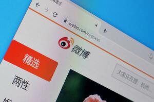 Homepage of weibo website on the display of PC, url - weibo.com. photo
