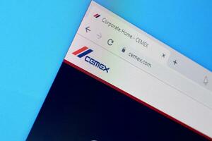 Homepage of cemex website on the display of PC, url - cemex.com. photo