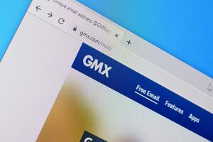 Homepage of gmx mail website on the display of PC, url - gmx.com. photo