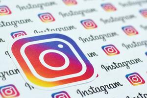 Instagram pattern printed on paper with small instagram logos and inscriptions. Instagram is American photo and video-sharing social networking service owned by Facebook