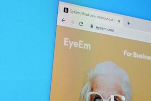 Homepage of eyeem website on the display of PC, url - eyeem.com. photo