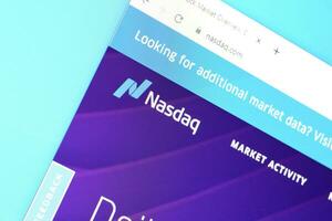 Homepage of nasdaq website on the display of PC, url - business.nasdaq.com. photo