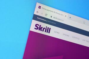 Homepage of skrill website on the display of PC, url - skrill.com. photo