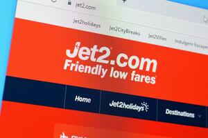 Homepage of jet2 website on the display of PC, url - jet2.com. photo