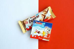 Kinder Chocolate small box for kids and bueno white chocolate bar made by Ferrero SpA. Kinder is a confectionery product brand line of multinational manufacturer Ferrero photo