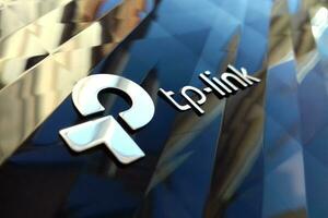 New tp-link logo on wireless router modem tp link Archer C20 AC750 reflective surface photo