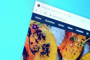 Homepage of adobe stock website on the display of PC, url - stock.adobe.com. photo