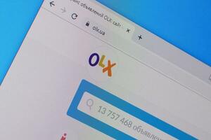 Homepage of olx website on the display of PC, url - olx.ua. photo