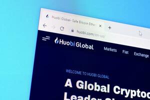 Homepage of huobi website on the display of PC, url - huobi.com. photo