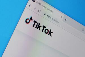 Homepage of tiktok website on the display of PC, url - tiktok.com. photo