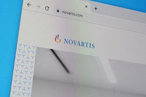 Homepage of novartis website on the display of PC, url - novartis.com. photo