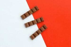 Kinder small Chocolate bars made by Ferrero SpA. Kinder is a confectionery product brand line of Italian multinational manufacturer Ferrero photo