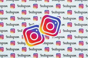 Instagram pattern printed on paper with small instagram logos and inscriptions. Instagram is American photo and video-sharing social networking service owned by Facebook