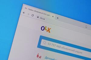Homepage of olx website on the display of PC, url - olx.ua. photo