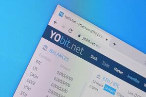 Homepage of yobit website on the display of PC, url - yobit.net. photo
