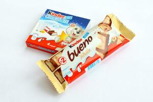 Kinder Chocolate small box for kids and bueno white chocolate bar made by Ferrero SpA. Kinder is a confectionery product brand line of multinational manufacturer Ferrero photo